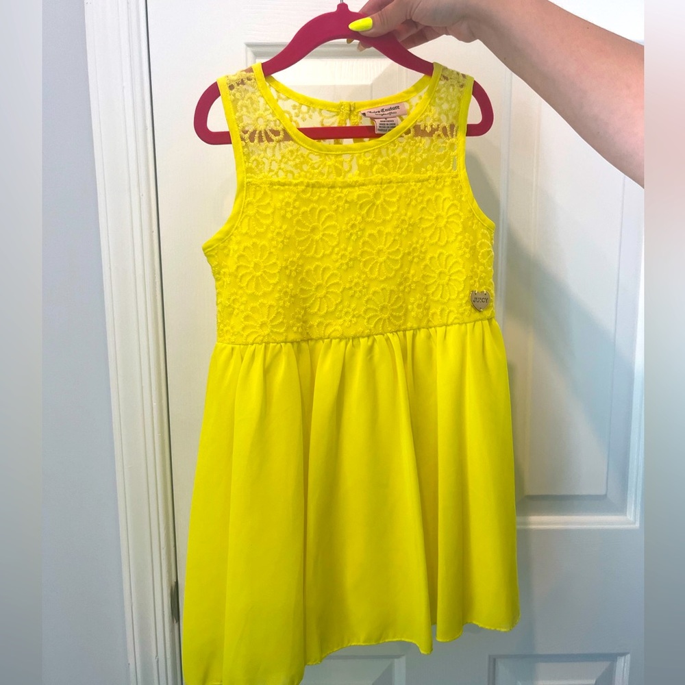 Yellow girls summer dress with floral pattern
